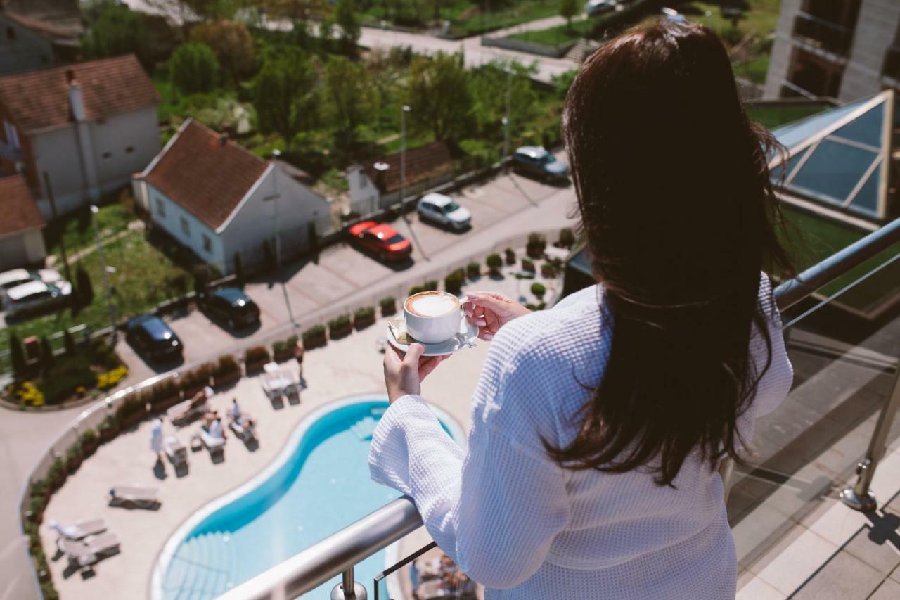 Hotel Premier Aqua - Adults Only Vrdnik Ngoại thất bức ảnh A woman on a balcony
