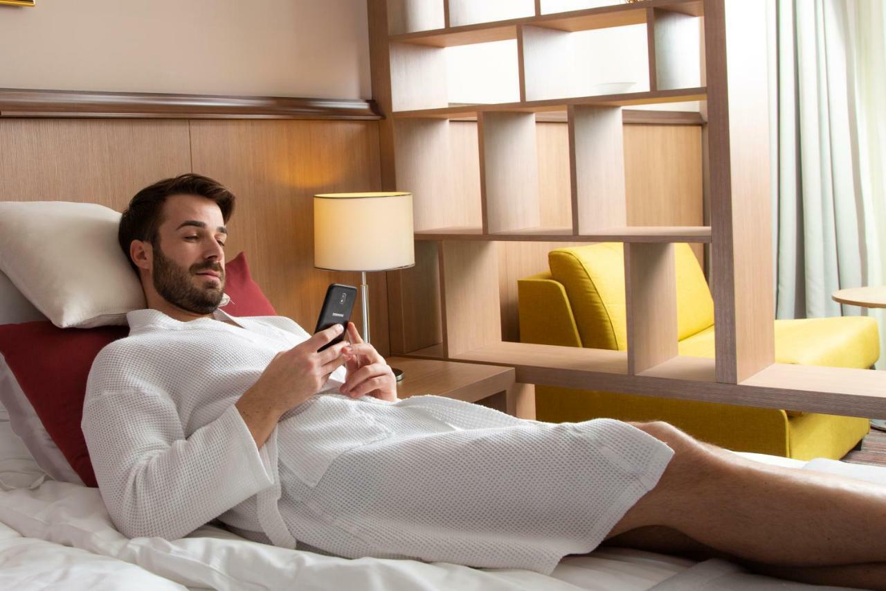 Hotel Premier Aqua - Adults Only Vrdnik Ngoại thất bức ảnh A man wearing a bathrobe